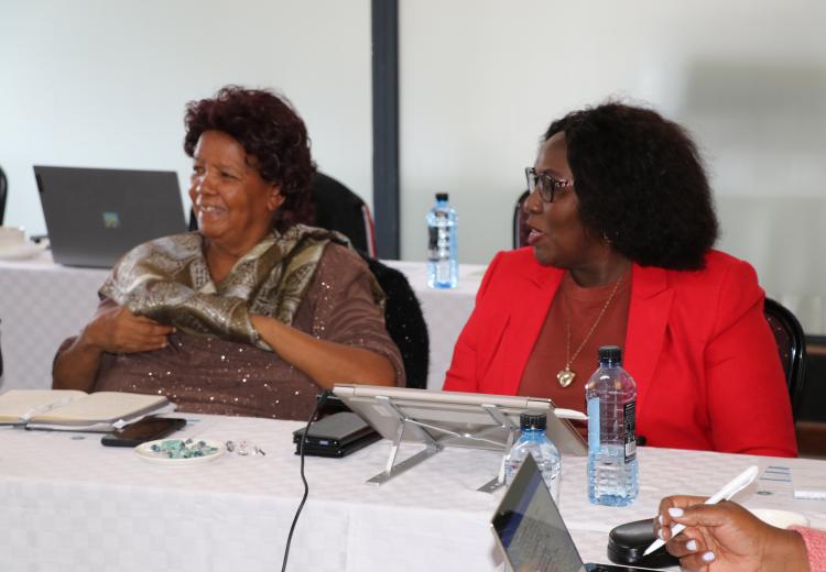 Prof. Wanjiku Kabira abd Prof. Tabitha Kiriti enjoy a light moment during session