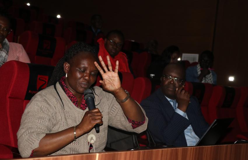 participant contributes to discussions during forum