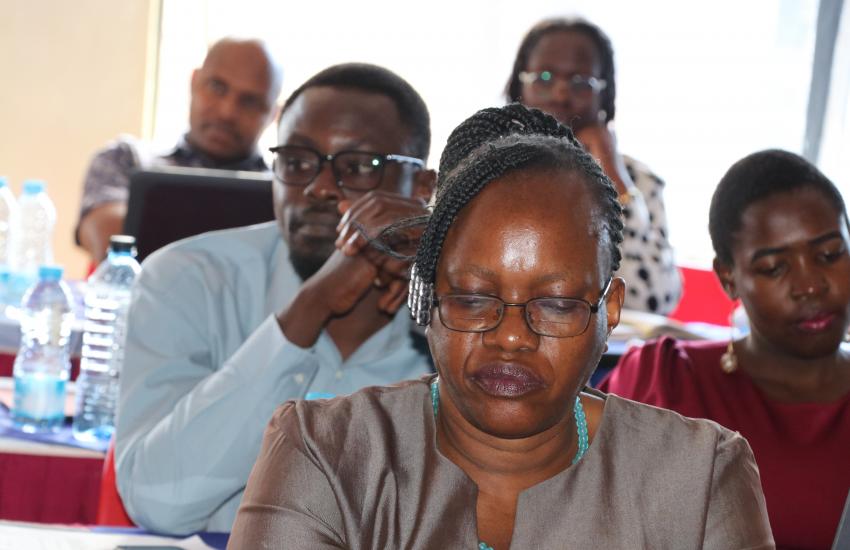 Participants follow discussions during workshop