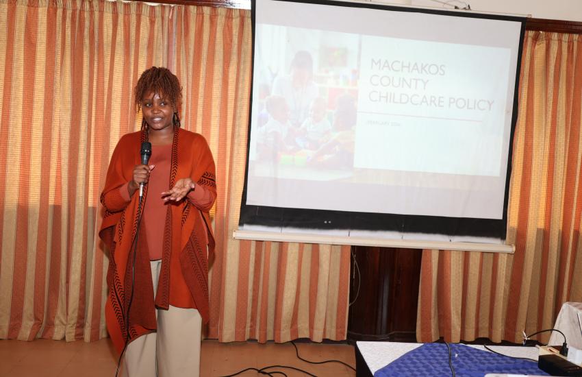 Rachael Keeru addresses participants during public participation meeting