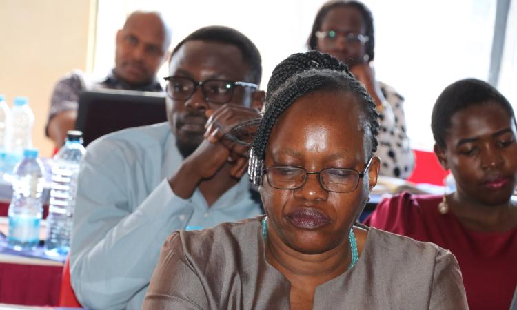 Participants follow discussions during workshop