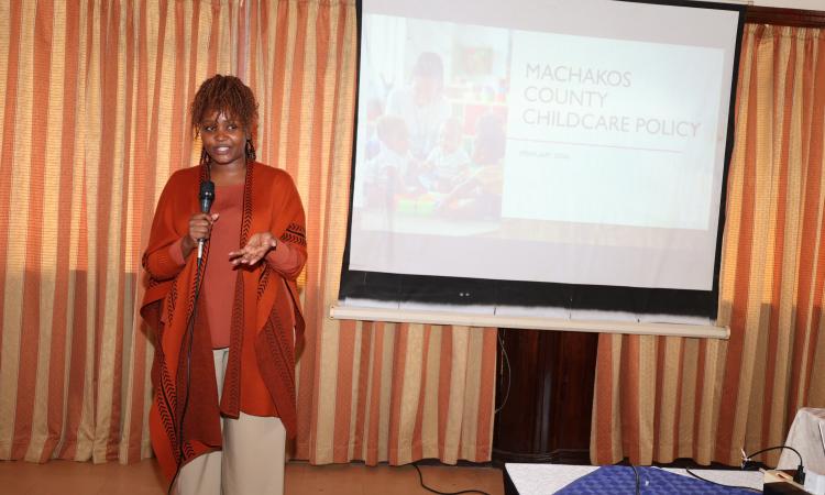 Rachael Keeru addresses participants during public participation meeting