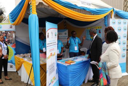 Gideon Muendo explains the WEE Hub's work to UoN Vice Chancellor Prof Stephen Kiama